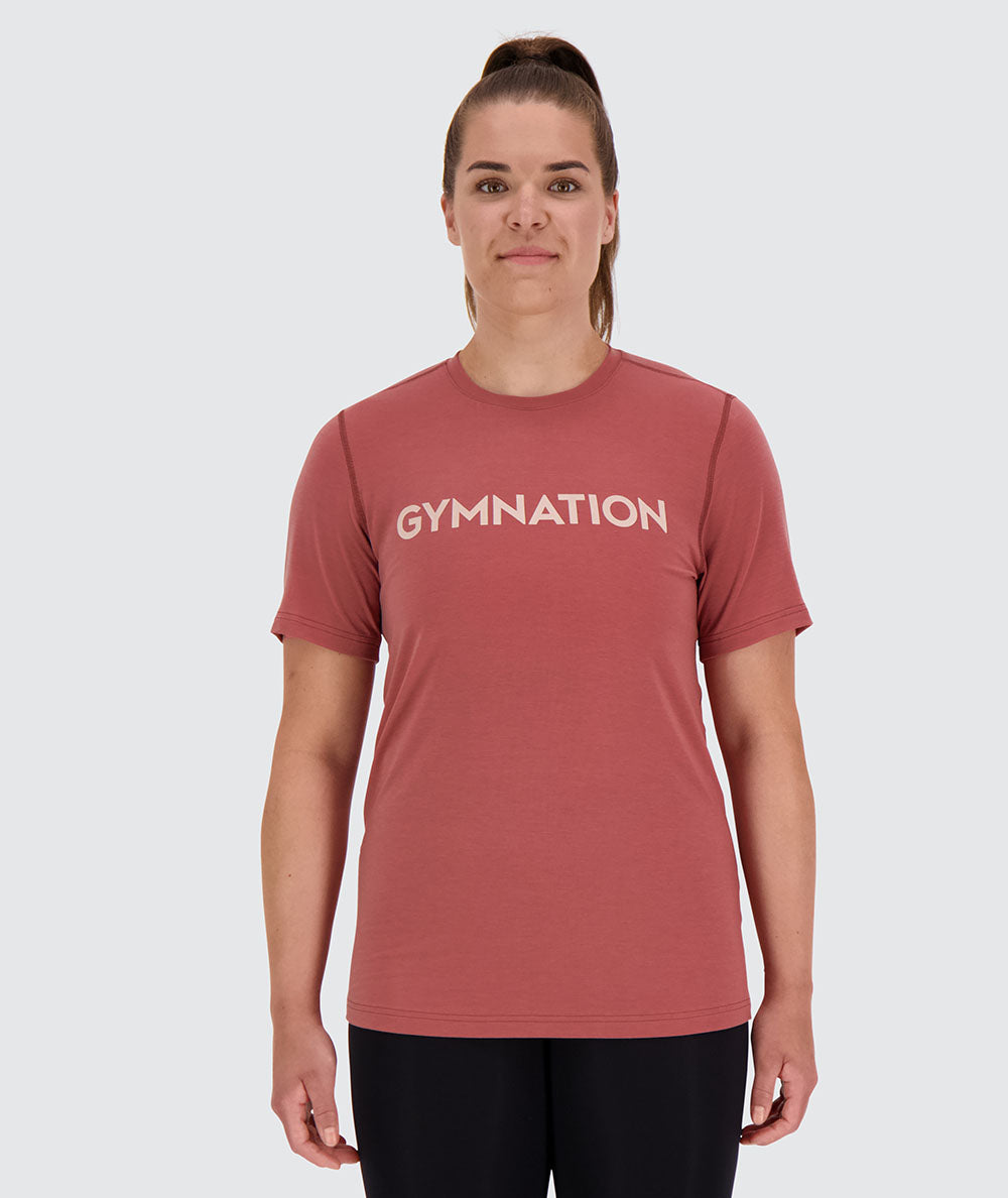 Sustainable and comfortable women's t-shirt for crossfit, Model 174 cm / Size M#color_brick